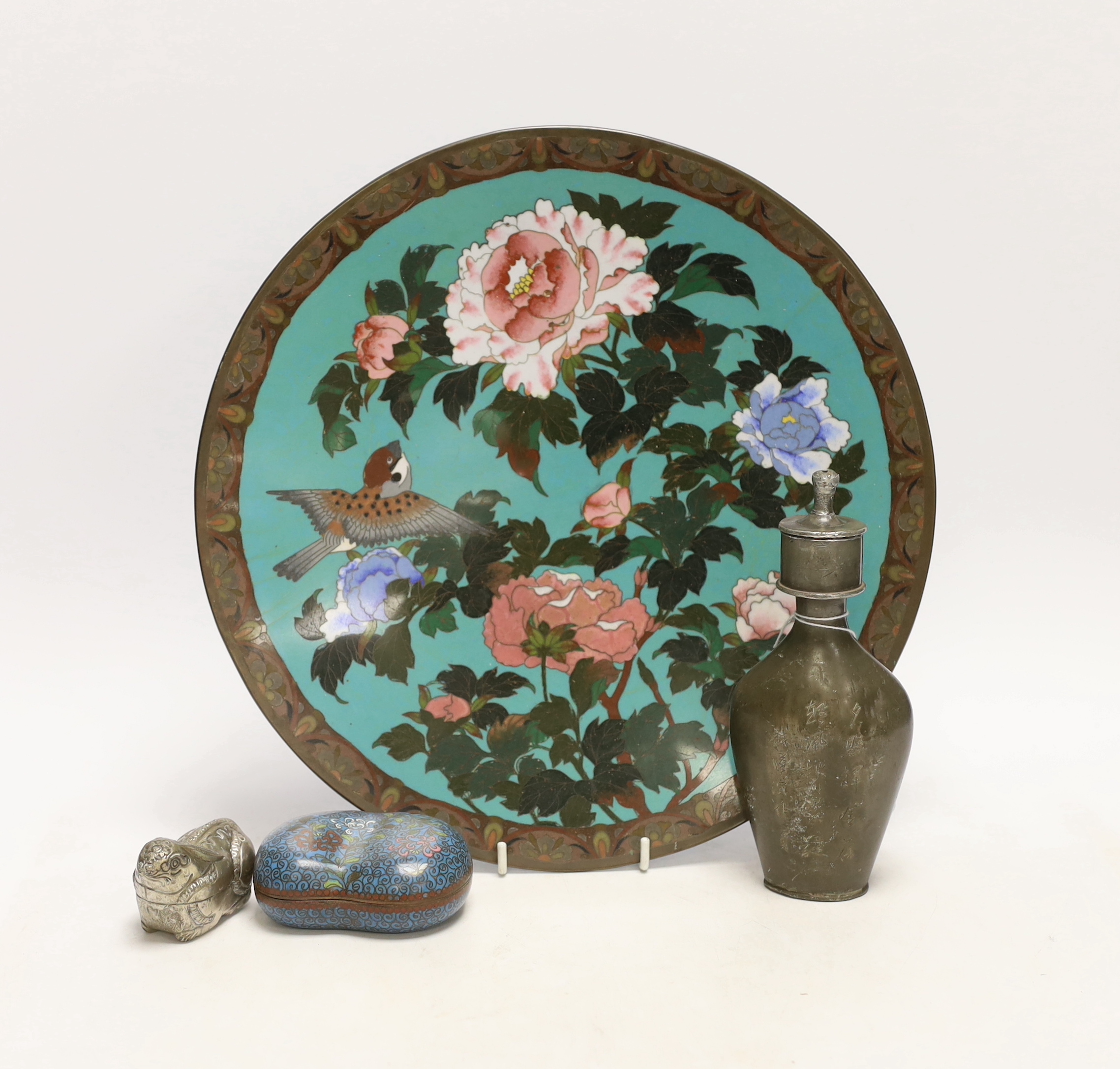 A Chinese cloisonné enamel kidney shaped box and cover, a pewter bottle and white metal ‘rabbit’ box and cover, and a Japanese cloisonné enamel dish, largest 30cm in diameter